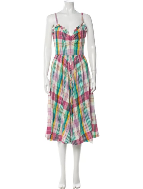 Colorful plaid midi dress with spaghetti straps and sweetheart neckline displayed on mannequin