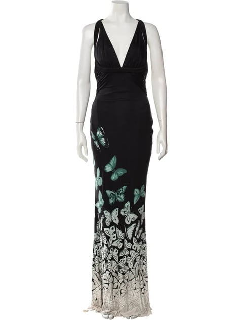 Black sleeveless evening gown on mannequin with butterfly and floral gradient print